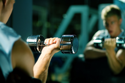 man lifitng weights